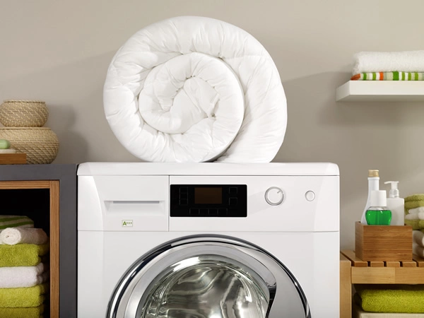 Kan je het wassen in de wasmachine? |